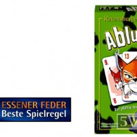Das Logo des Preises Essener Feder und die Schachtel von Abluxxen.